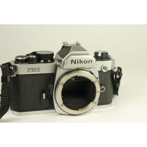 6027 - A Nikon FM2 35mm SLR Film Camera w/ Instruction manual