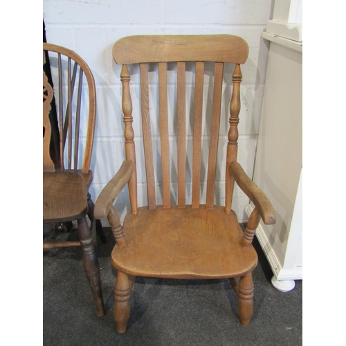 1020 - A low pine farmhouse kitchen chair and a wheel back chair (2)