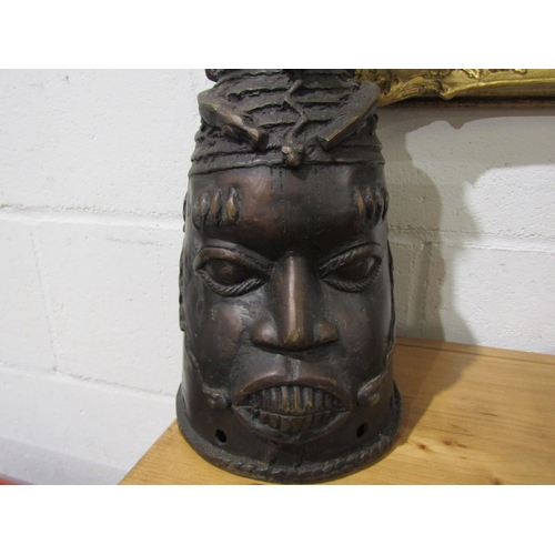 1035 - A Benin bronze Oduduwa helmet mask, 52cm height