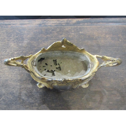 1045 - A late 19th Century French cast gilt table centre/planter with original liner (some holes), 31cm lon... 