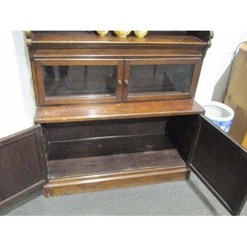 1048 - An early 20th Century oak Globe-Wernicke style oak bookcase cupboard, 135cm tall x 89cm wide x 38cm ... 