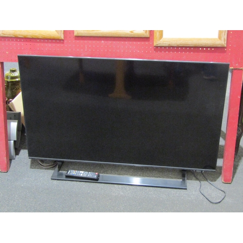 1061 - A Samsung 43'' television, model UE43AU9000KXXU, with remote control