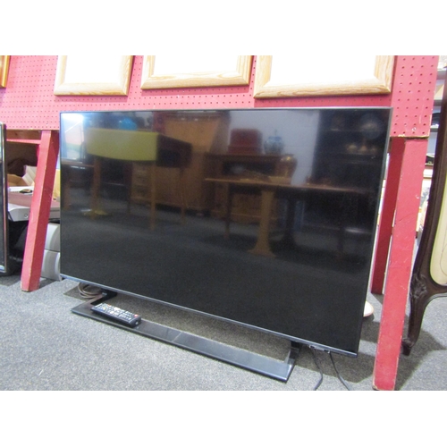 1061 - A Samsung 43'' television, model UE43AU9000KXXU, with remote control