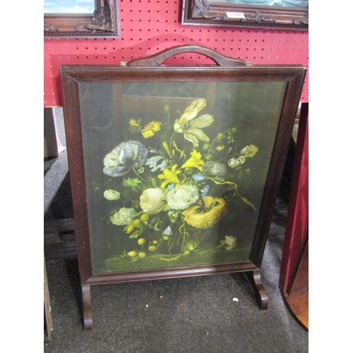 1081 - A fire screen, oak surround with image of flowers/still-life, 73cm (including handle) x 51cm