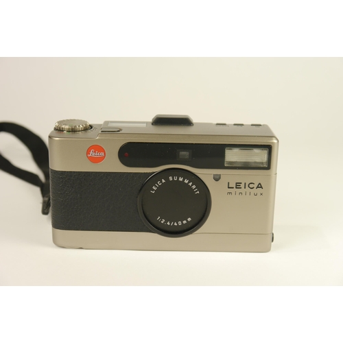 6078 - A cased Leica Minilux Summarit Titanium compact 35mm film camera w/ f2.4 40mm lens & Instructions