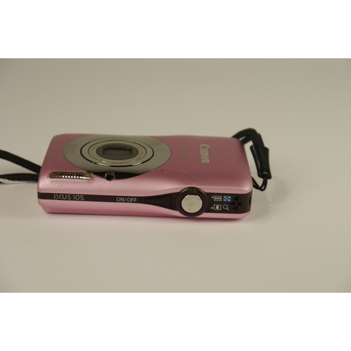 6069 - A Canon IXUS 105 12.1 Mega Pixel Digital Camera in Pink w/charger and manual 
**Untested**