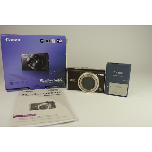 6067 - A Boxed Canon PowerShot SX200 IS 12MP Compact Digital Camera w/Canon Battery Charger a Spare Battery... 