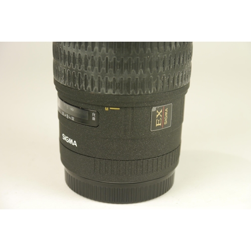 6014 - A Sigma DC 105mm f2.8 EX Marco lens w/ lens hood