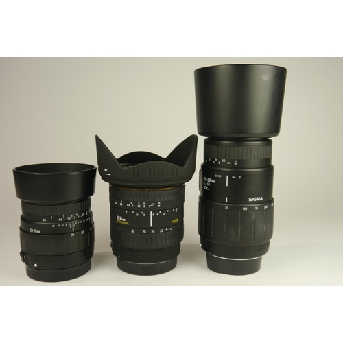 6098 - Three Sigma lenses including a Sigma 17-35mm f2.8-4 EX HSM Aspherical all come with lens hoods