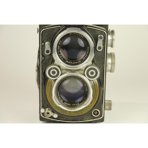 6005 - A cased Rolleiflex Serial number 1204334 thought to be either model 2.8A K7A or 2.8B K7B