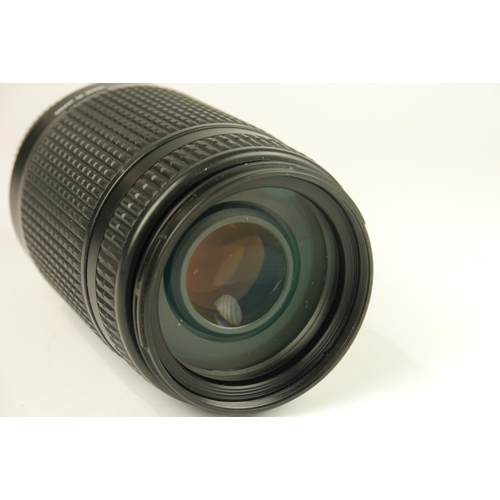 6019 - Three Nikon AF Nikkor Lenses
Models: 
Nikkor 28-100mm F3.5-5.6 G Zoom
Nikkor 70-300mm F4-5.6 G Zoom
... 