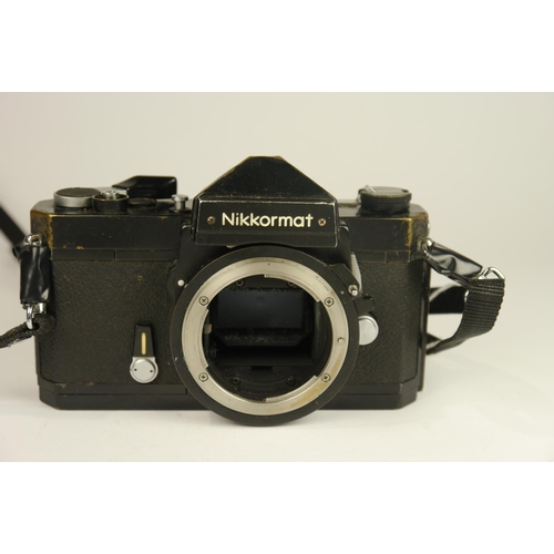 6024 - A Nikon Nikkormat FTN SLR 35mm film camera (Body Only) & A Nikon EM SLR 35mm film Camera w/ Nikon MD... 