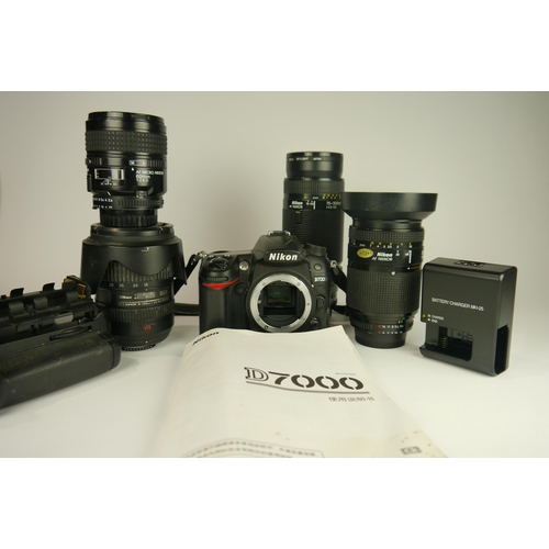 6097 - A Boxed Nikon D7000 DSLR Camera w/
Nikon AF-S DX Nikkor 18-200mm F3.5-5.6g ED VR 
Nikon Af Nikkor 75... 