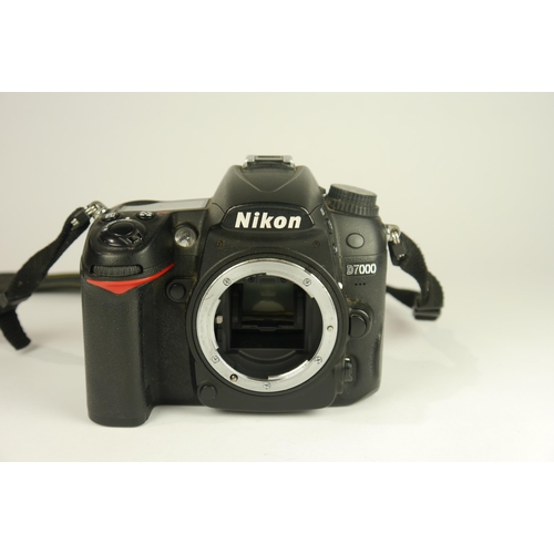 6097 - A Boxed Nikon D7000 DSLR Camera w/
Nikon AF-S DX Nikkor 18-200mm F3.5-5.6g ED VR 
Nikon Af Nikkor 75... 