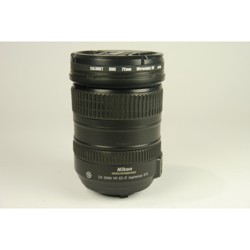 6097 - A Boxed Nikon D7000 DSLR Camera w/
Nikon AF-S DX Nikkor 18-200mm F3.5-5.6g ED VR 
Nikon Af Nikkor 75... 