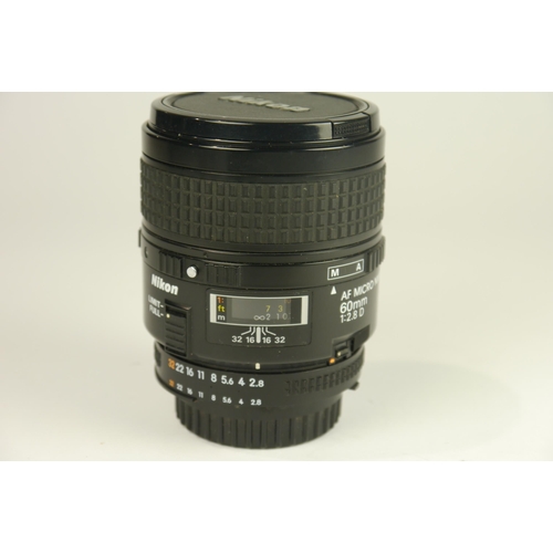 6097 - A Boxed Nikon D7000 DSLR Camera w/
Nikon AF-S DX Nikkor 18-200mm F3.5-5.6g ED VR 
Nikon Af Nikkor 75... 