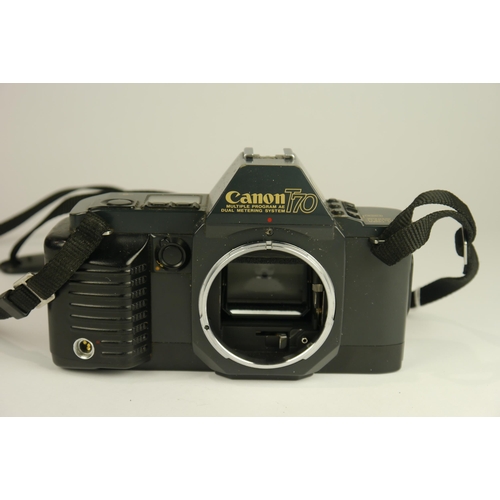 6056 - A Canon T70 35mm Multi-Mode SLR camera w/ Canon FD 35-70mm f3.5-4.5 Zoom Lens