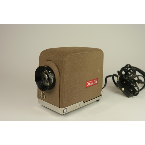 6091 - A cased Minolta mini 35 slide projector with blower & a Minolta slide autochanger