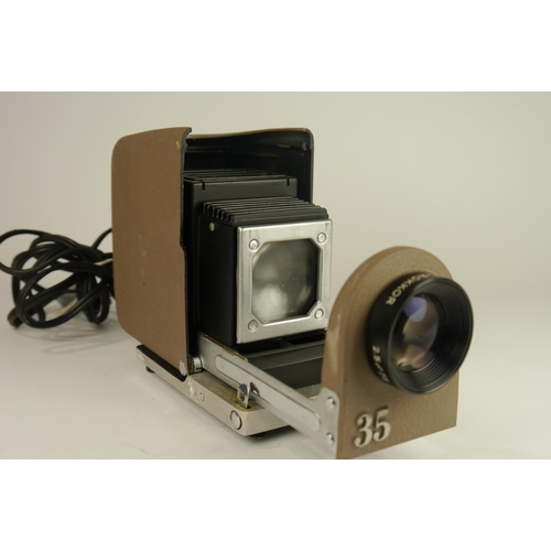 6091 - A cased Minolta mini 35 slide projector with blower & a Minolta slide autochanger