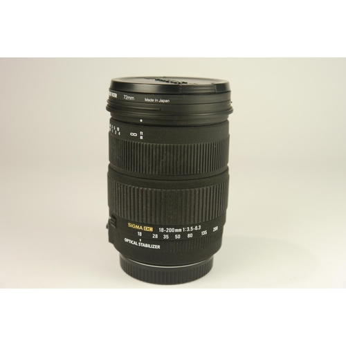 6016 - A Sigma DC 18-200mm f3.5-6.3 DC OS lens w/ lens hood