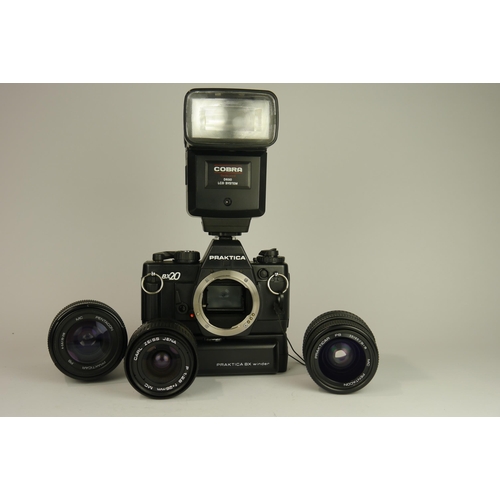 6062 - A Cased Praktica BX20 35mm SLR film camera w/ Praktica BX winder, Praktica Pentacon MC 35-700mm f3.5... 