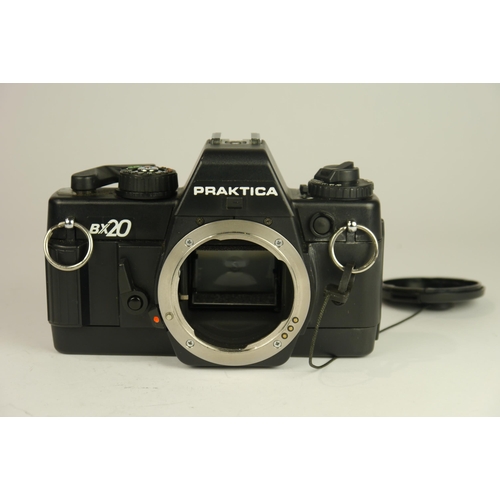 6062 - A Cased Praktica BX20 35mm SLR film camera w/ Praktica BX winder, Praktica Pentacon MC 35-700mm f3.5... 