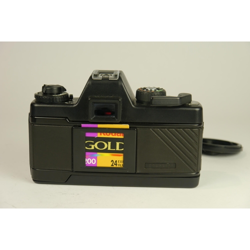 6062 - A Cased Praktica BX20 35mm SLR film camera w/ Praktica BX winder, Praktica Pentacon MC 35-700mm f3.5... 