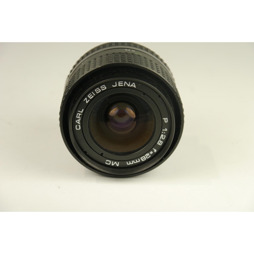 6062 - A Cased Praktica BX20 35mm SLR film camera w/ Praktica BX winder, Praktica Pentacon MC 35-700mm f3.5... 