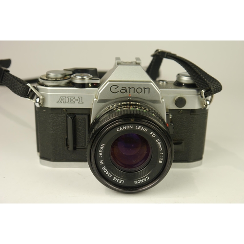 6059 - A Canon AE-1 SLR 35mm film camera w/ Canon FD 50mm f1.8 lens