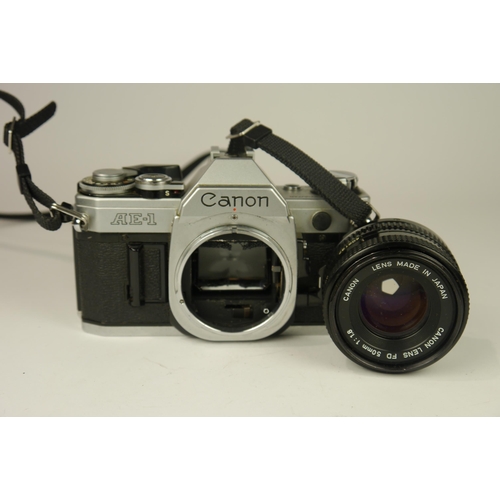 6059 - A Canon AE-1 SLR 35mm film camera w/ Canon FD 50mm f1.8 lens