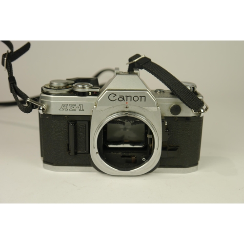 6059 - A Canon AE-1 SLR 35mm film camera w/ Canon FD 50mm f1.8 lens