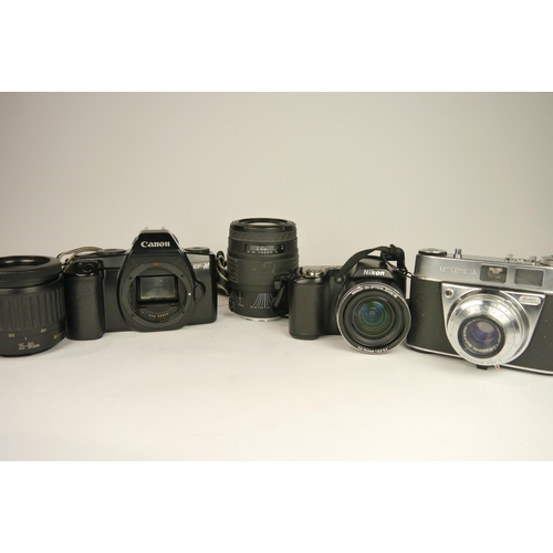 6086 - A Canon EF-M SLR 35mm Film camera w/ Canon 35-80mm f4-5.6 & Sigma UC Zoom 70-200mm lenses and a Niko... 