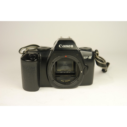 6086 - A Canon EF-M SLR 35mm Film camera w/ Canon 35-80mm f4-5.6 & Sigma UC Zoom 70-200mm lenses and a Niko... 