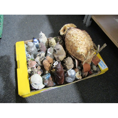 1407 - Three boxes containing a large quantity of owl figures and related items including lamp, mugs, soft ... 