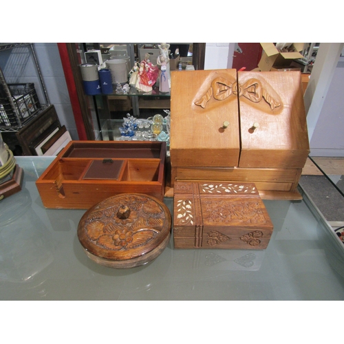 1425 - A wooden card and letter box, a jewellery box, an ornately carved box and bowl with lid (4)