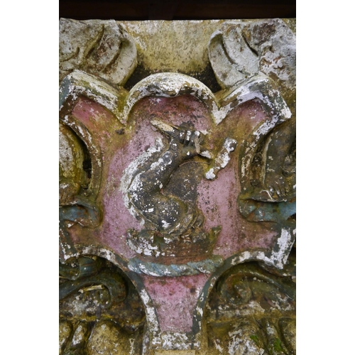 2001 - A 19th Century weathered and painted terracotta armorial panel, H64cm W76cm D50cm