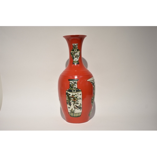 4326 - A large Chinese vase with deep red ground decorated with further examples of oriental vases with dou... 