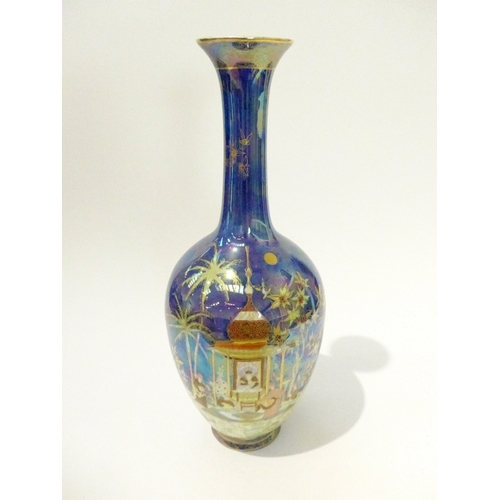 4341 - A Carlton Ware bottle vase in Persian pattern on Royal Blue ground, No.3925, with poppies and cornfl... 