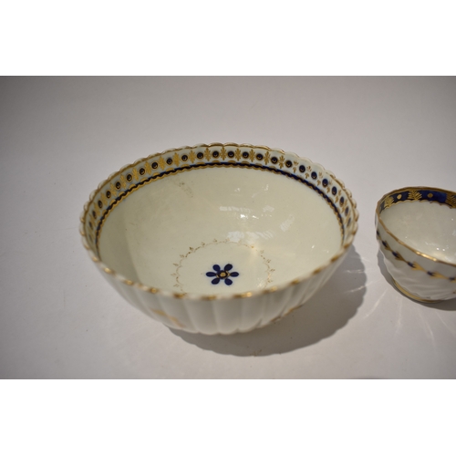 4429 - A Caughley fluted slop bowl and similar tea bowl