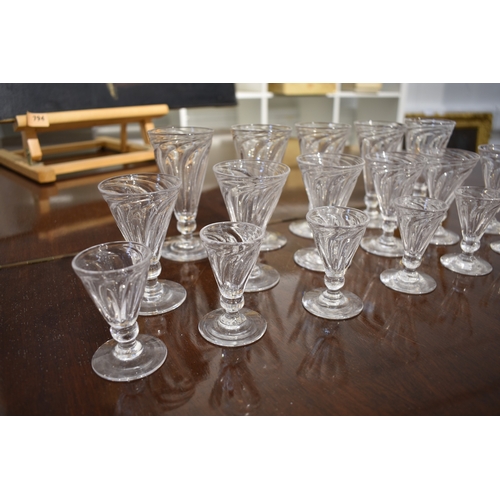 4481 - A suite of Georgian wrythen form glasses of three varying sizes (17)