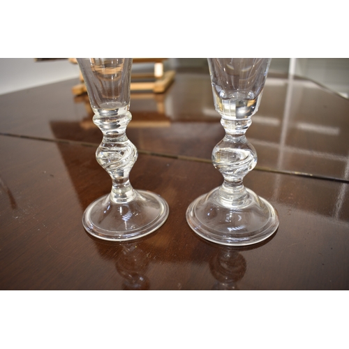 4500 - A pair of 19th Century wine glasses with trumpet bowl air twist knop over bell foot, 18cm tall