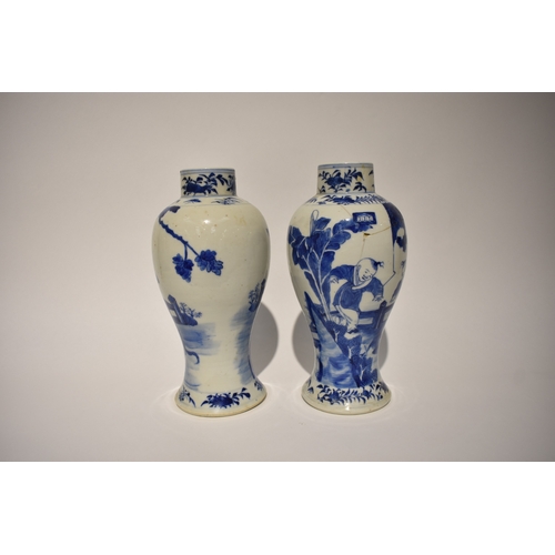 4034 - A pair of Kangxi period bulbous vases decorated with mother and children playing in garden setting, ... 