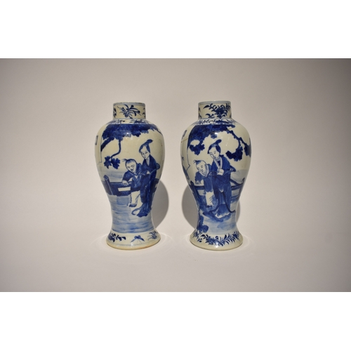 4034 - A pair of Kangxi period bulbous vases decorated with mother and children playing in garden setting, ... 