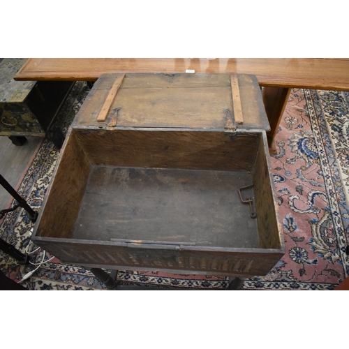 4129 - A 17th Century country oak Bible box/chest on stand, the plank top over a lunette carved front, on l... 