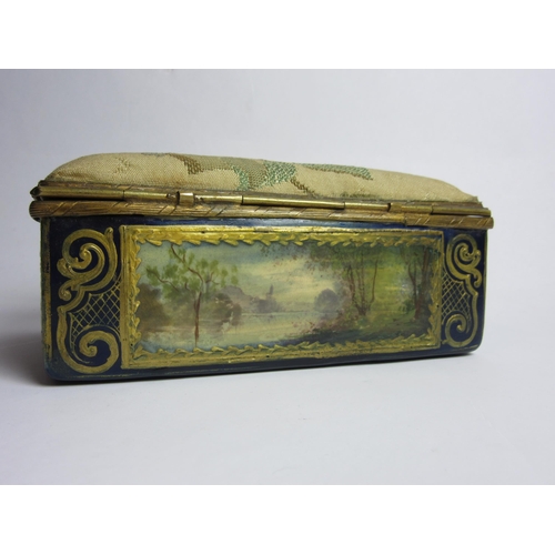 4430 - An enamelled trinket box, hand painted panels of landscapes, enriched with gilt, needlepoint lid