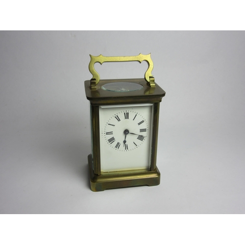 4436 - A brass carriage clock with leather case