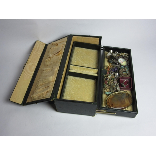 4449 - A green leather jewellery case and box with bijouterie contents including Continental silver, coral ... 