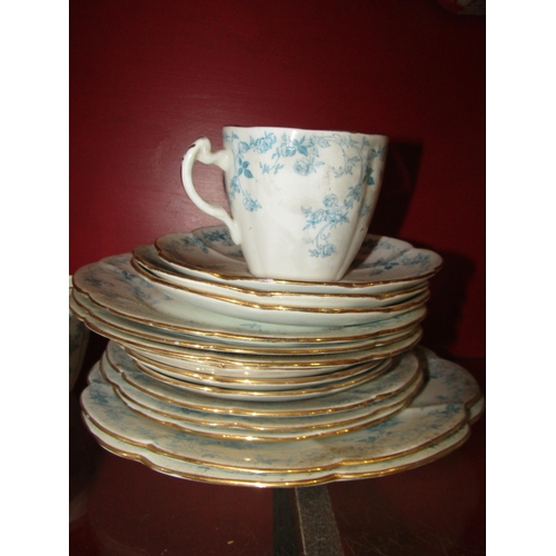 4007 - A collection of Foley china ware, white ground with blue floral design