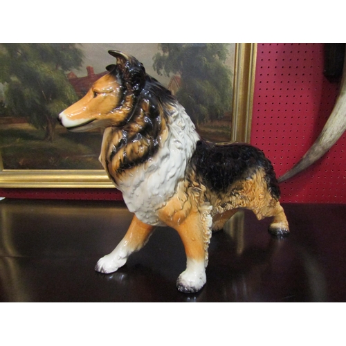 4035 - A large Goebel ceramic Collie dog, 30cm tall