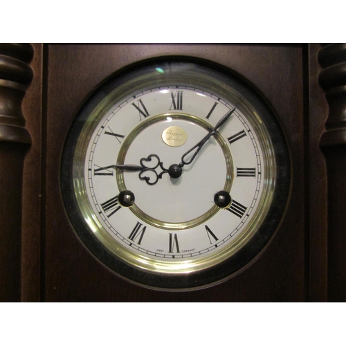 4080 - A Rapport London wall clock, a/f, with key and pendulum